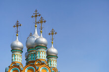 Russian Christian Orthodox Church With Domes And A Cross Against The Sky. Russian Orthodoxy And Christian Faith Concept.