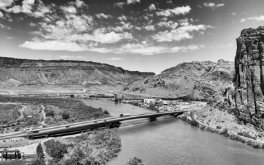 Wall Mural - Colorado River near Moab, Utah. Arches National Park gateway, aerial view from drone at sunset