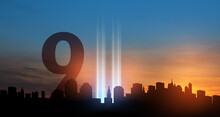 September 11 Tribute In Light Art Installation In The Lower Manhattan New York City Skyline At Sunset. 9.11 Date Concept. American Patriot Day Banner.