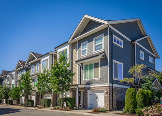 New Modern Apartment Buildings in Vancouver BC. Canadian modern residential architecture on sunny day.