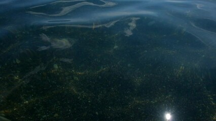 Canvas Print - WATER SURFACE WITH FLASH ON THE SEA