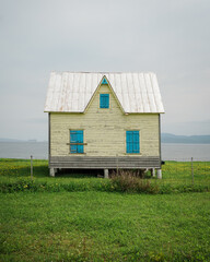 Wall Mural - An old house with view of the sea in Gaspé, Gaspé, Quebec, Canada