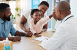 © Nina Lawrenson/peopleimages.com - High five, doctor and family with a girl and her parents at the hospital for consulting, appointment and healthcare. Medicine, trust and support in a medical clinic with a health professional