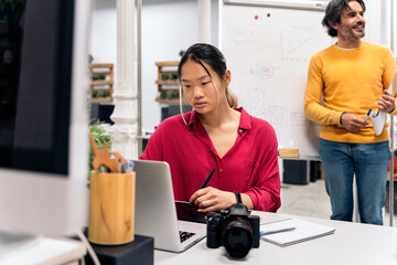 Wall Mural - Asian Woman Working in Office