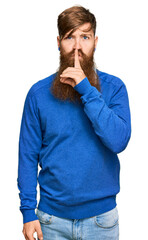 Sticker - Young irish redhead man wearing casual clothes asking to be quiet with finger on lips. silence and secret concept.