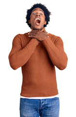 Poster - Handsome african american man with afro hair wearing casual clothes shouting and suffocate because painful strangle. health problem. asphyxiate and suicide concept.