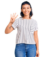 Poster - Young woman wearing casual clothes showing and pointing up with fingers number four while smiling confident and happy.