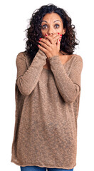 Poster - Middle age beautiful woman wearing casual sweater shocked covering mouth with hands for mistake. secret concept.