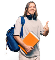 Sticker - Handsome caucasian man with long hair wearing student backpack and holding books smiling happy and positive, thumb up doing excellent and approval sign