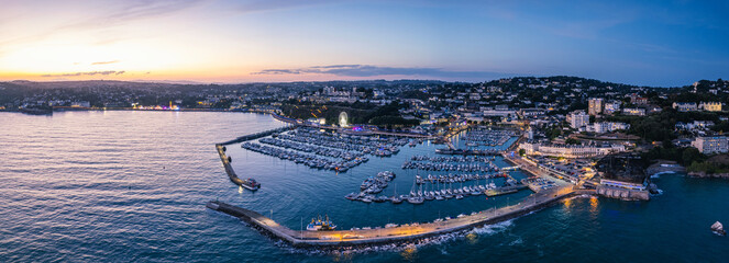 Wall Mural - Sunset over Torquay Harbour and Marina, English Riviera from a drone, Devon, England, Europe