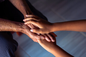 The asian old woman's hand was alone. Grandma's hands and grandchildren's