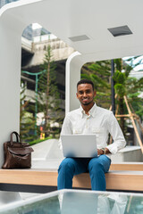 Poster - Portrait of young handsome stylish black man in city