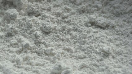 Poster - white powder close-up rotates in a circle