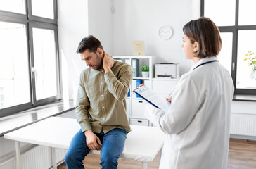 Sticker - medicine, healthcare and people concept - male patient with pain in neck and female doctor at medical office in hospital