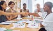 © Azeemud-Deen Jacobs/peopleimages.com - Creative business people handshake in a meeting for thank you, promotion or design innovation and success with team applause. Diversity group shaking hands for collaboration deal, teamwork or welcome