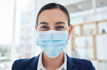 Poster - Safety, compliance and face mask covid regulations at work with a young employee in an office. Corporate professional smiling and looking positive, enjoying her career and hygiene at the workplace