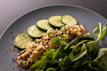 Wall Mural - Close-up of healthy food in plate on table, copy space