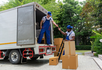 Professional goods move service use truck carry personal belongings door to door transport delivery handover boxes luggage one by one and keep stack on the floor one of box falling down and staff yell