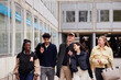 © Johnér - Group of friends walking at campus
