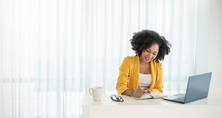 Black African smiling beautiful business woman working in office use computer with copy space. Business owner people sme freelance online marketing e-commerce telemarketing, work from home concept