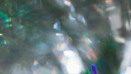 Wall Mural - Emerald Gemstone Overflows. Loop. The light passes through the facets of a slowly rotating diamond and creates repetitive sparkling highlights and rainbow colors