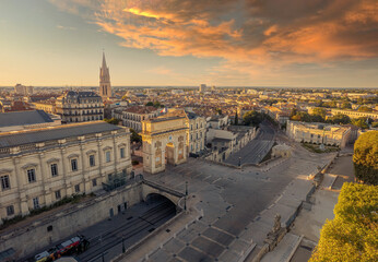 Wall Mural - Aerial view of The Porte du Peyrou and  Montpellier city at sunrise, France. The Porte du Peyrou is a triumphal arch in Montpellier, in southern France.