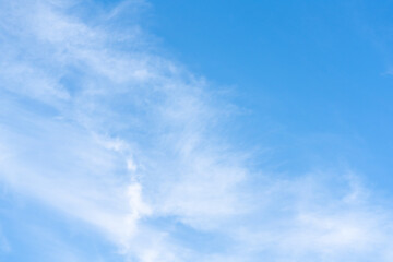 Wall Mural - Beautiful cirrus clouds on blue sky on a sunny day background texture