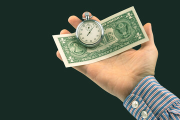 mechanical stopwatch and dollars in man hand. Part time accuracy for business. business and finance time.