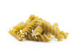 Pasta in a close up, green colored, vegan, pasta, fusilli, noodle, white background, cropped image