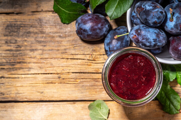 Homemade plum jam in small jar