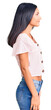 © Krakenimages.com - Young beautiful latin girl wearing casual clothes looking to side, relax profile pose with natural face with confident smile.