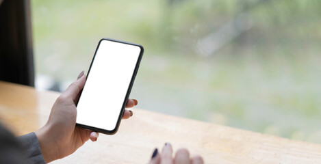 women hand holding phone isolated background - clipping path easy adjustment
