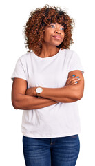 Poster - Young african american woman wearing casual white tshirt smiling looking to the side and staring away thinking.