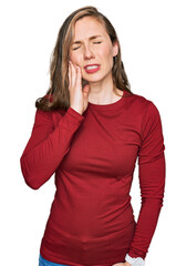 Sticker - Young blonde woman wearing casual clothes touching mouth with hand with painful expression because of toothache or dental illness on teeth. dentist