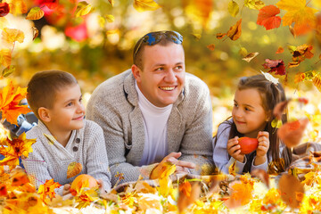 Poster - Happy family father and child daughter on a walk in the autumn leaf fall in park