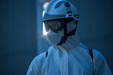 Portrait Of A Firefighter Ready For Disinfecting The Walls Of A Building