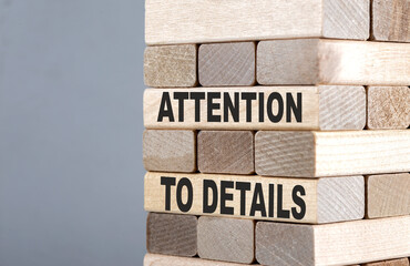 Poster - The text on the wooden blocks ATTENTION TO DETAILS
