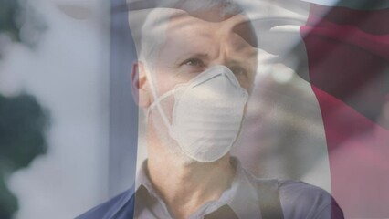 Poster - Animation of flag of france waving over caucasian man wearing face mask in city street