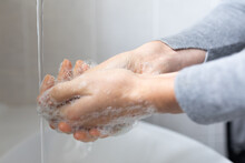 Close Up Mid Section Of Caucasian Woman Washing Her Hands During Coronavirus Covid19 Pandemic