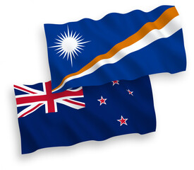 National vector fabric wave flags of Republic of the Marshall Islands and New Zealand isolated on white background. 1 to 2 proportion.