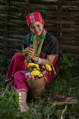 Wall Mural - Beautiful Asian young tribal lady in the native traditional dress culture of Karen people minority ethnic culture. Portraits of identity dress folk applying fashion concepts.