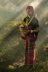 Wall Mural - Beautiful Asian young tribal lady in the native traditional dress culture of Karen people minority ethnic culture. Portraits of identity dress folk applying fashion concepts.