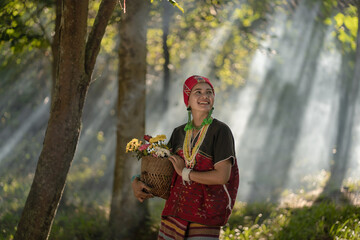 Wall Mural - Beautiful Asian young tribal lady in the native traditional dress culture of Karen people minority ethnic culture. Portraits of identity dress folk applying fashion concepts.