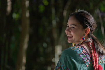 Wall Mural - Beautiful Asian young tribal lady in the native traditional dress culture of Karen people minority ethnic culture. Portraits of identity dress folk applying fashion concepts.