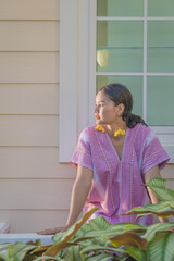 Wall Mural - Beautiful Asian young tribal lady in the native traditional dress culture of Karen people minority ethnic culture. Portraits of identity dress folk applying fashion concepts.