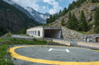 lądowisko dla śmigłowców przy drodze w alpach, tunel lawinowy, Italy helipad on road in alps, avalanche tunnel