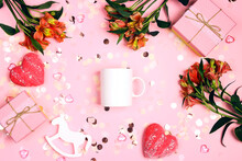 Mockup Of A White Mug On A Pink Table With Festive Accessories.