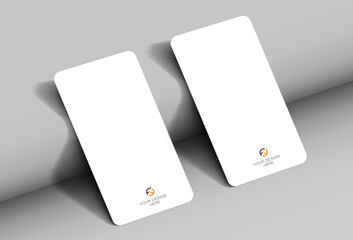 Wall Mural - Mockup of a realistic business card with rounded corners, on a textured background with realistic shadows. Vector illustration EPS 10