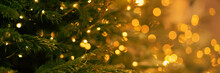 Christmas Tree Banner With A Garland Of Lights On A Blurred Background