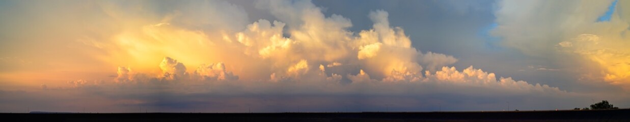 Wall Mural - panorama of dramatic vibrant color with cloud of sunrise
